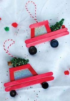 red popsicle stick ornament with tiny Christmas tree