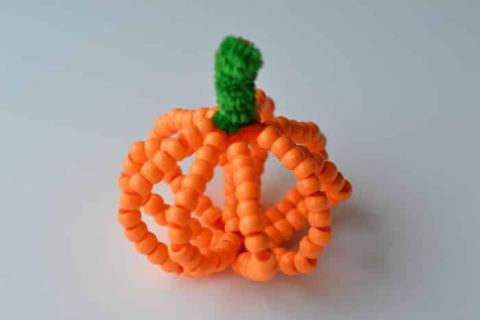 beaded pipe cleaners shaped like a pumpkin