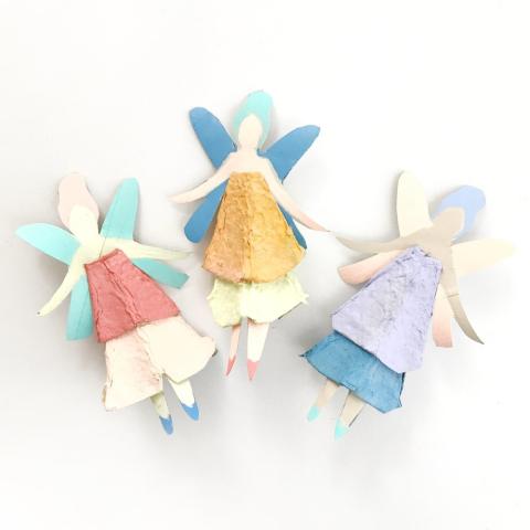 three fairies get ready to fly 
